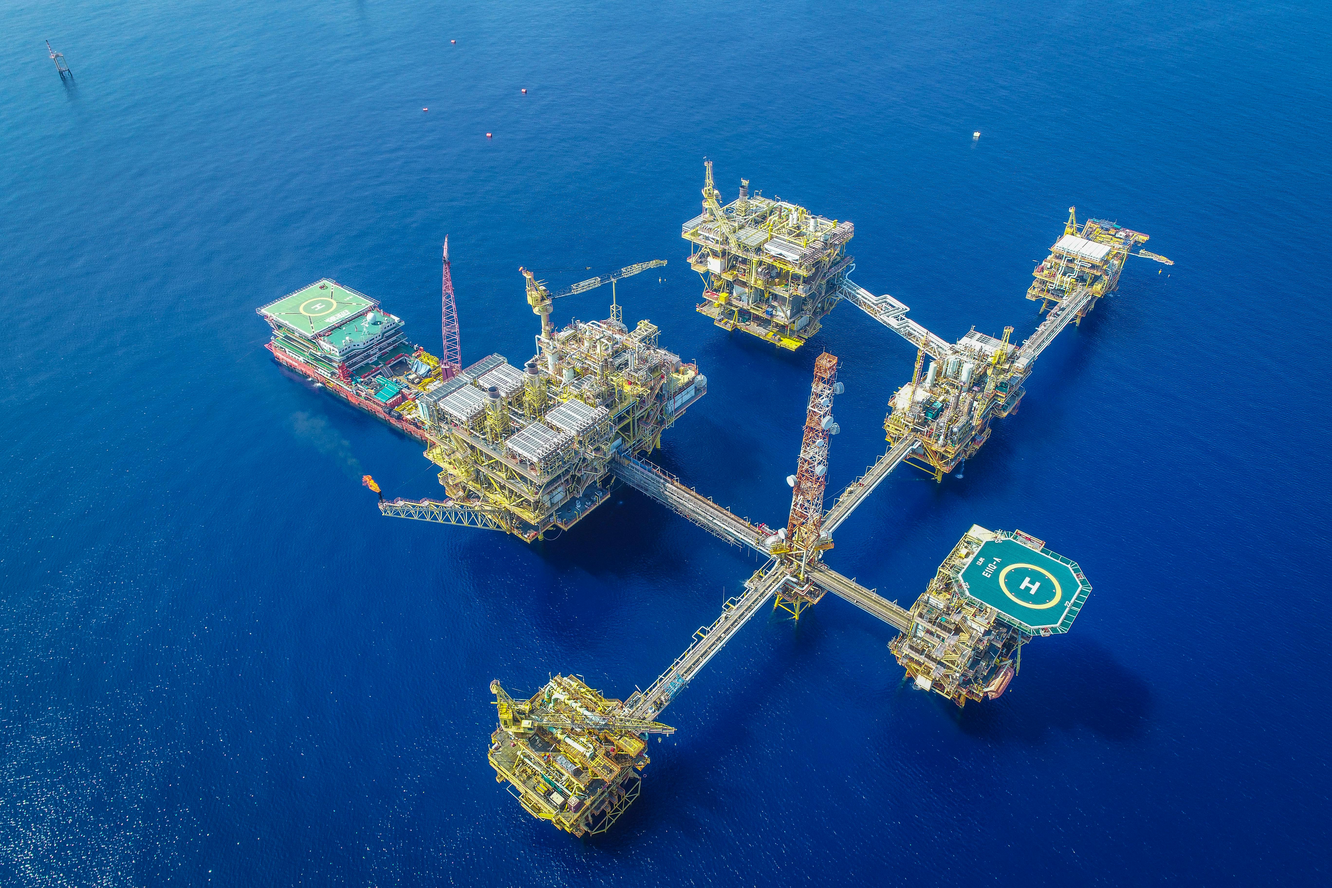 Aerial view of offshore oil and gas platform at sea